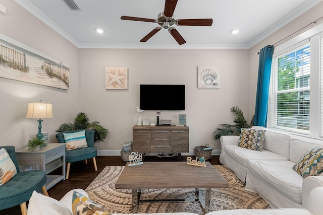 living area with crown molding, recessed lighting, visible vents, wood finished floors, and baseboards