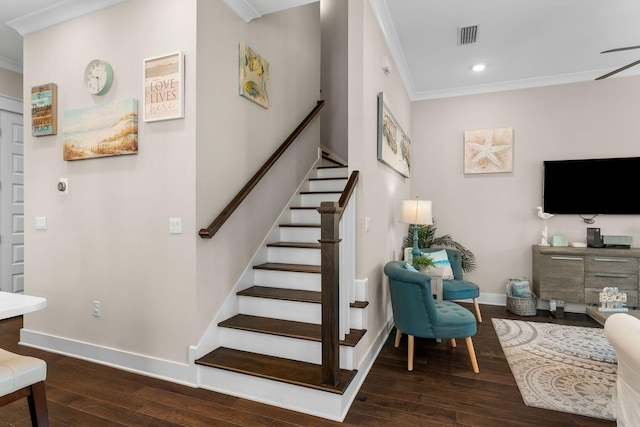 stairway with recessed lighting, visible vents, baseboards, hardwood / wood-style floors, and crown molding