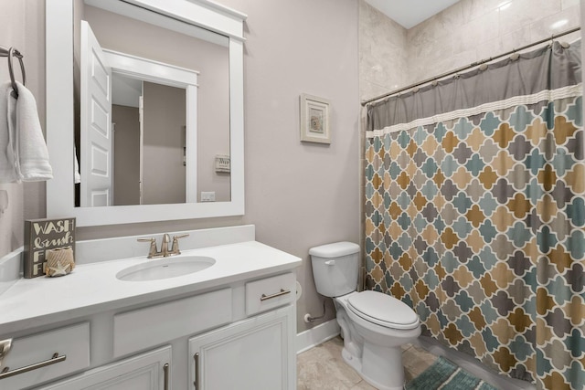 full bathroom with toilet, vanity, and a shower with curtain