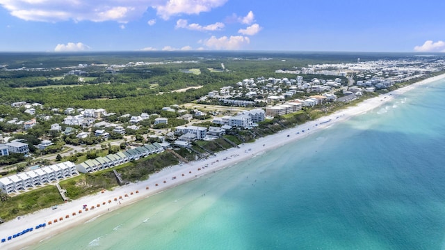 drone / aerial view with a beach view and a water view
