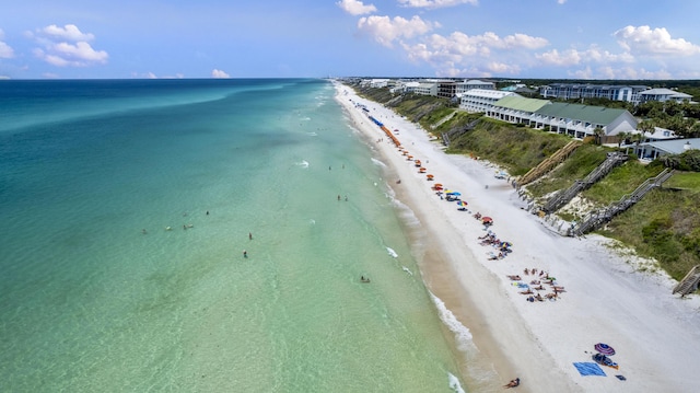 aerial view with a view of the beach and a water view