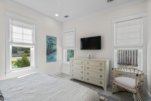 tiled bedroom featuring baseboards, visible vents, and recessed lighting