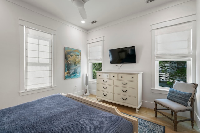 bedroom featuring ceiling fan and light hardwood / wood-style floors