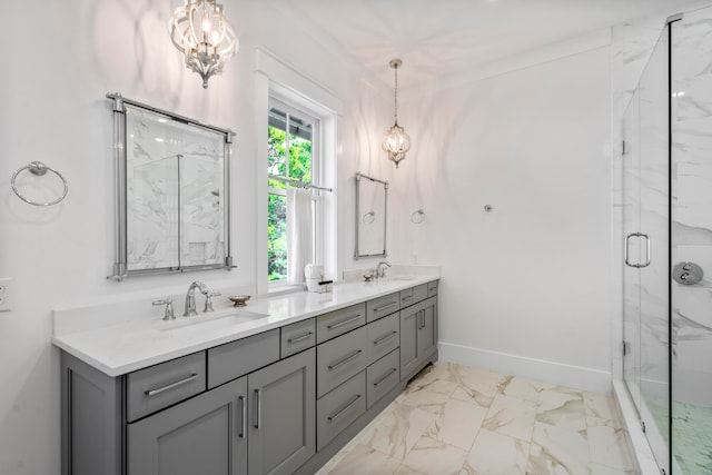 bathroom with tile patterned floors, walk in shower, vanity, and a chandelier