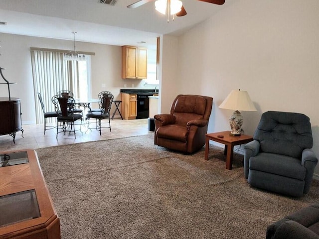 living area featuring a ceiling fan