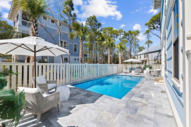 view of pool with a patio