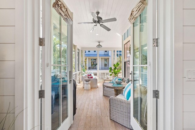 balcony featuring ceiling fan and a porch