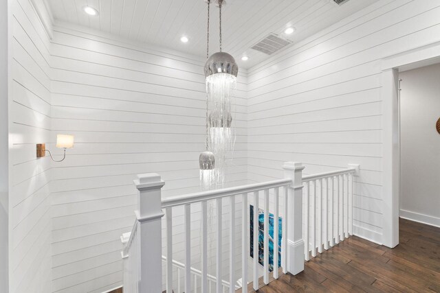 hallway featuring hardwood / wood-style flooring