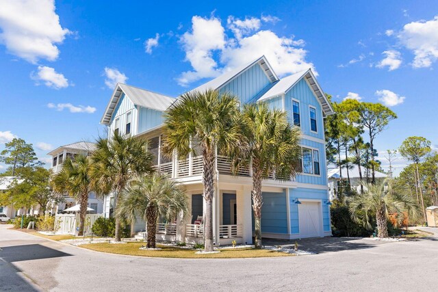 coastal home featuring a garage