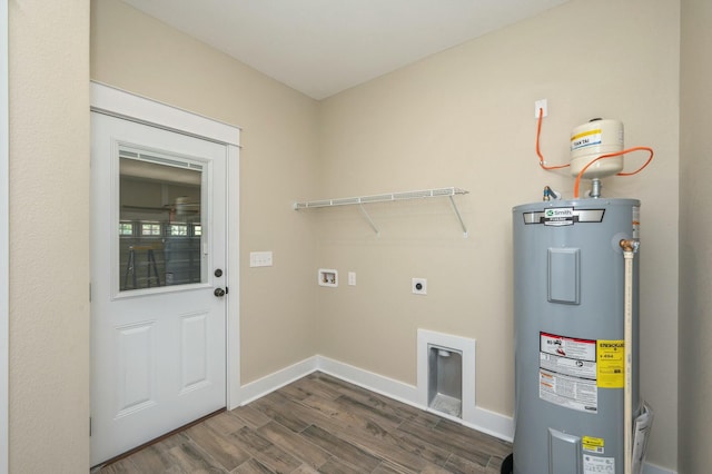 washroom featuring electric dryer hookup, water heater, washer hookup, and dark hardwood / wood-style floors