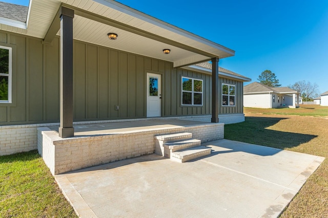 property entrance with a patio area