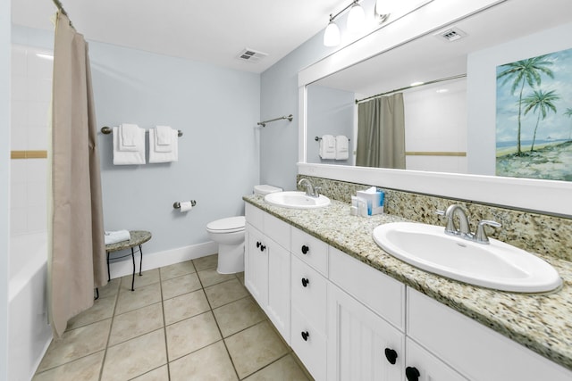 full bathroom featuring tile patterned flooring, toilet, shower / tub combo, and vanity