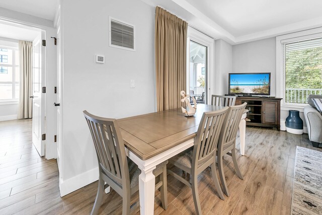 dining room featuring light wood-type flooring