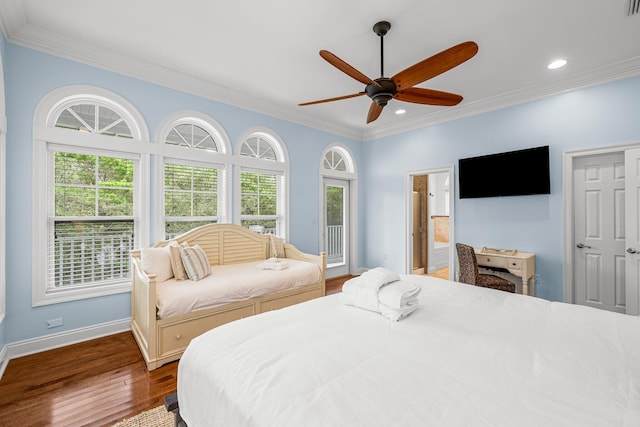 bedroom featuring ceiling fan, ornamental molding, and hardwood / wood-style floors