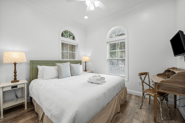 bedroom with ceiling fan, dark hardwood / wood-style floors, and crown molding