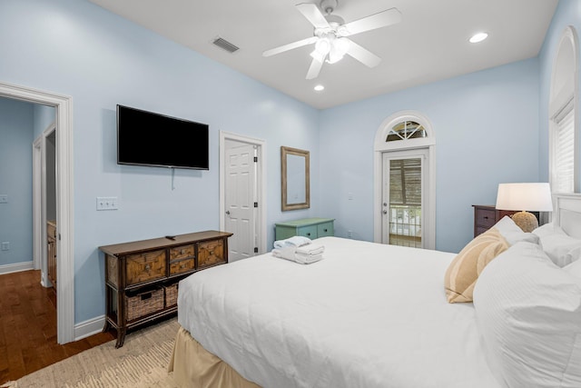 bedroom with light wood-type flooring and ceiling fan