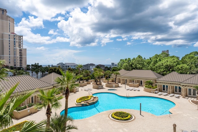 view of swimming pool featuring a patio