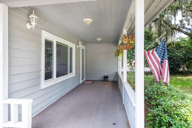 view of patio featuring a porch