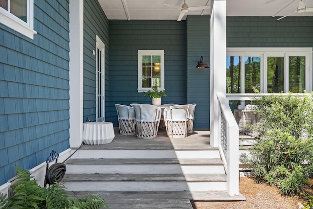 exterior space featuring ceiling fan