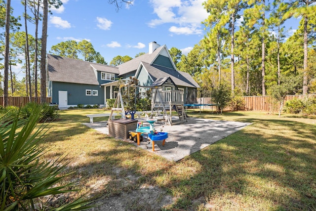 exterior space with a lawn and a patio area