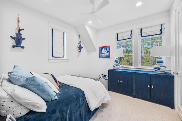 carpeted bedroom featuring ceiling fan