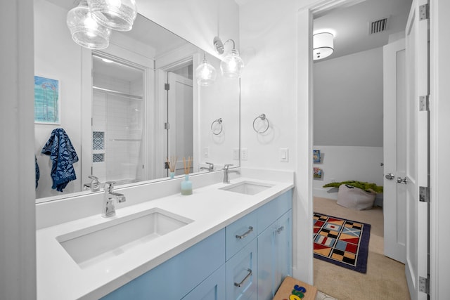 bathroom featuring a shower and vanity