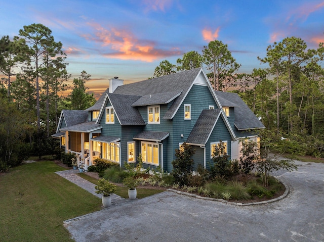 view of front of home with a lawn