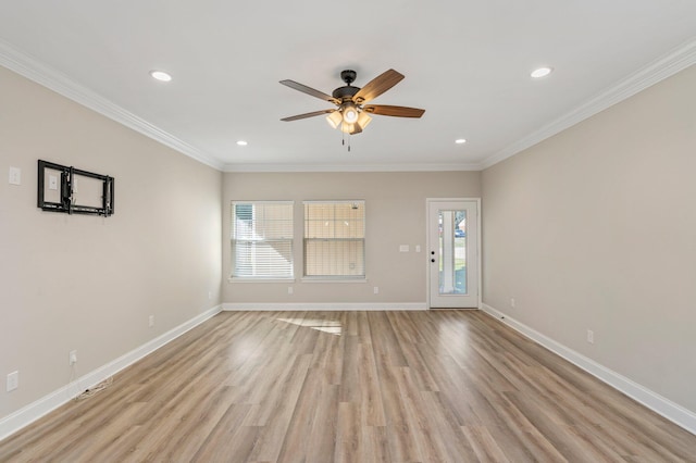 unfurnished living room featuring ornamental molding, light hardwood / wood-style flooring, and ceiling fan