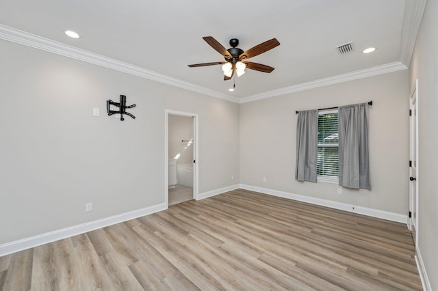 unfurnished bedroom with light hardwood / wood-style flooring, ornamental molding, connected bathroom, and ceiling fan