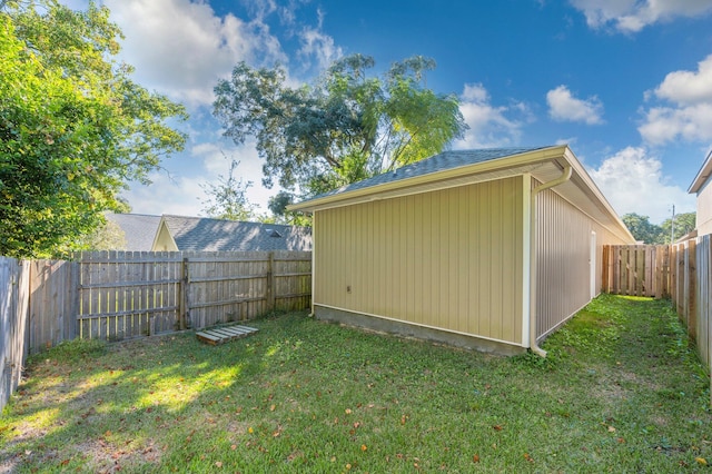 view of property exterior with a lawn