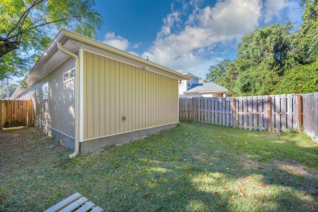 view of home's exterior featuring a yard