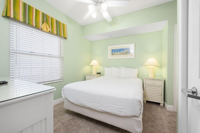 bedroom featuring ceiling fan and carpet floors