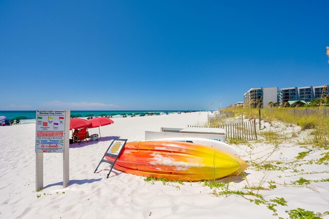 view of community featuring a view of the beach and a water view