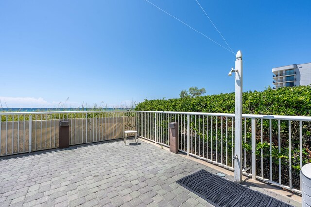 view of patio / terrace featuring a water view