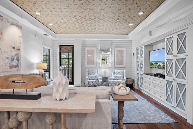 living room featuring dark wood-type flooring