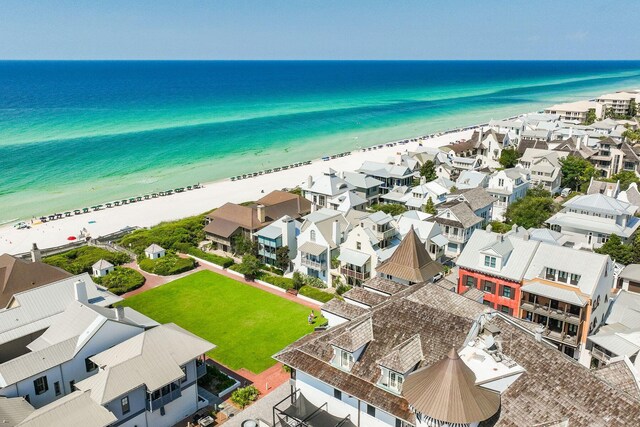 aerial view with a beach view and a water view