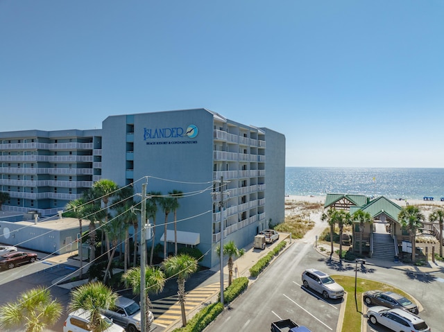 view of building exterior featuring a water view