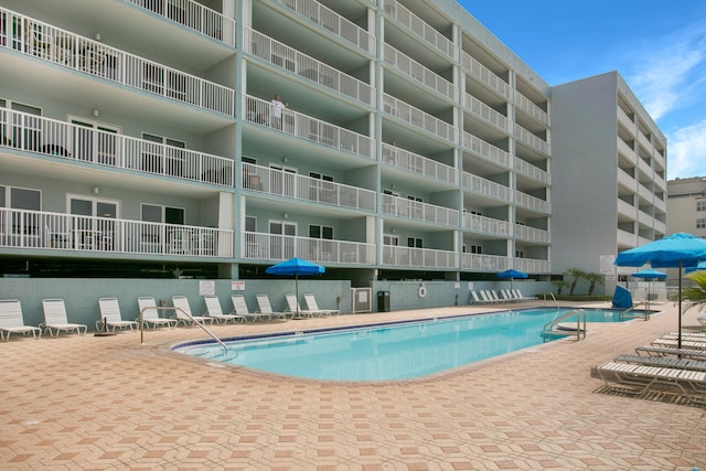 view of pool with a patio area