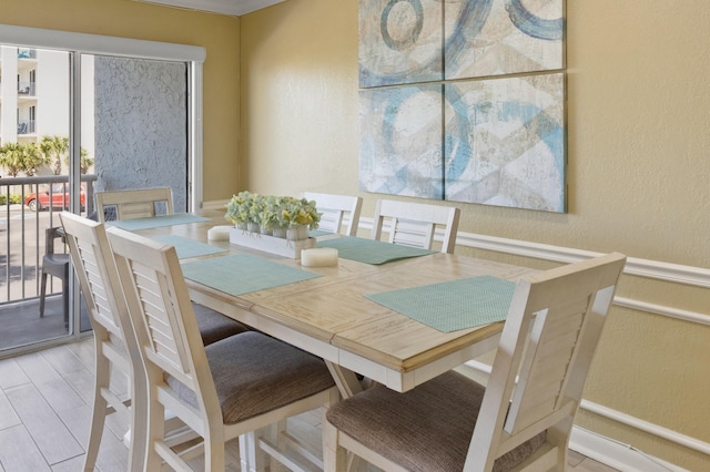 dining space featuring light wood-type flooring