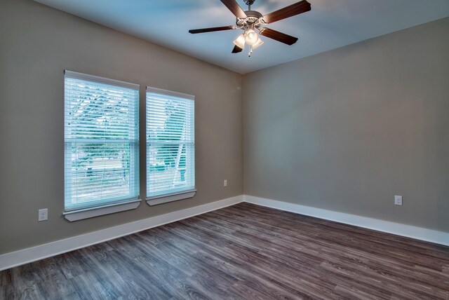 unfurnished room featuring ceiling fan and wood-type flooring