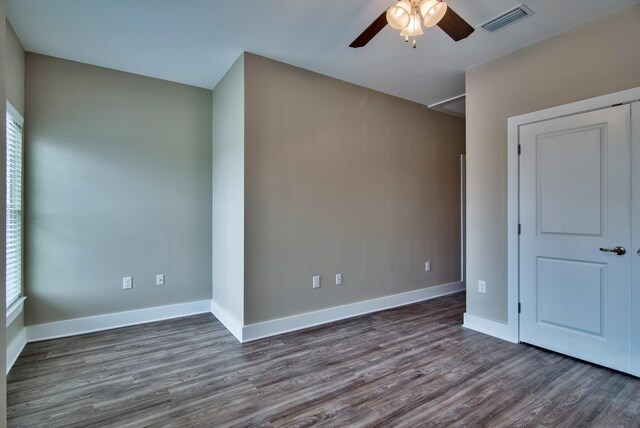 spare room featuring ceiling fan and wood-type flooring