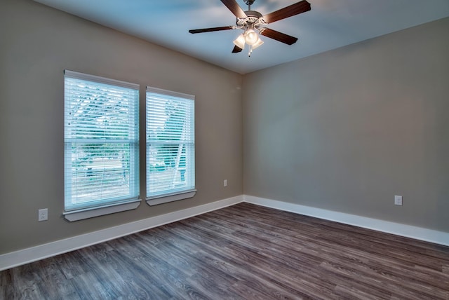 empty room featuring ceiling fan and hardwood / wood-style flooring