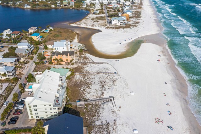 aerial view with a beach view and a water view