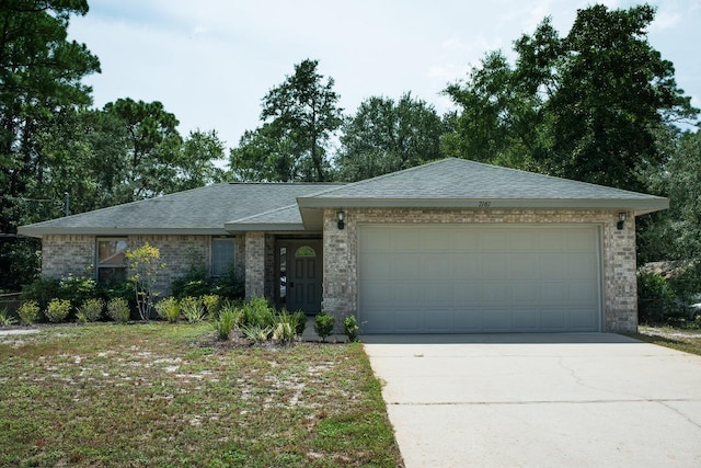 single story home with driveway, brick siding, roof with shingles, and an attached garage