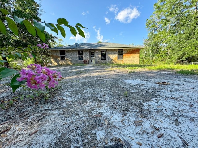 single story home featuring cooling unit