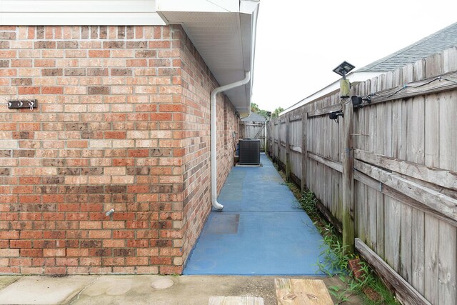 view of home's exterior featuring central AC unit