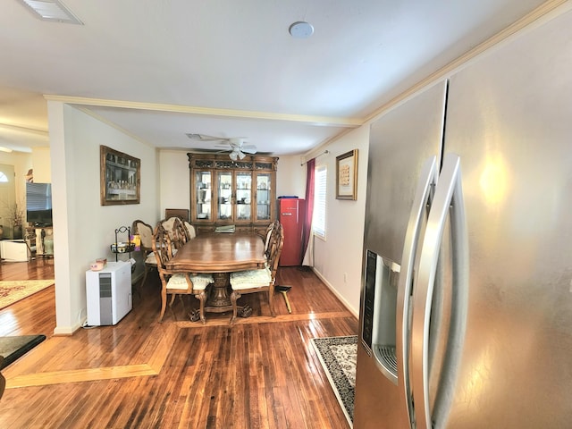 dining area with ceiling fan, hardwood / wood-style flooring, and ornamental molding