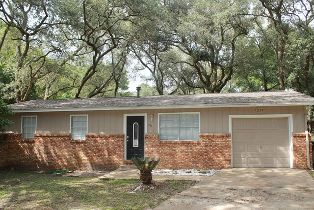 ranch-style home with a garage