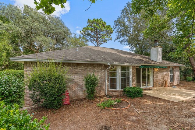 back of house with a patio area