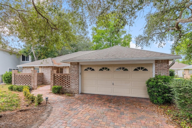 ranch-style home with a garage